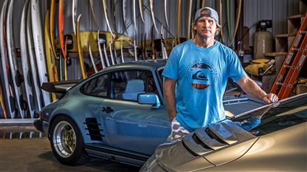 Robby Naish next to his 911 Carrera S (Type 991) and 911 S from 1977